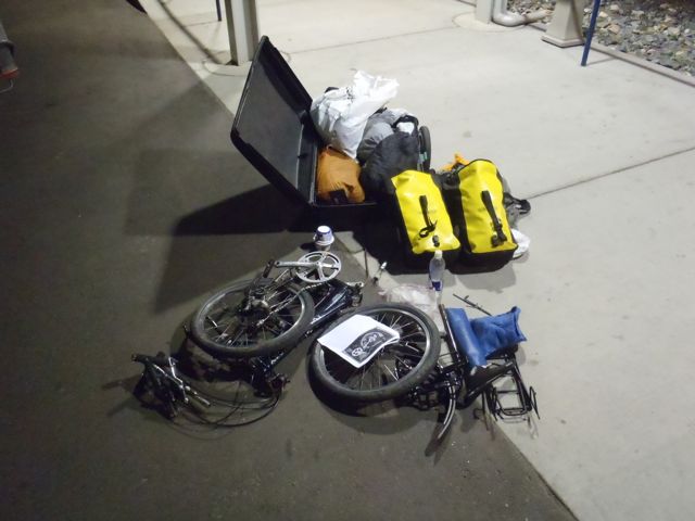 Disassembling bicycle, Amtrak station, Denver